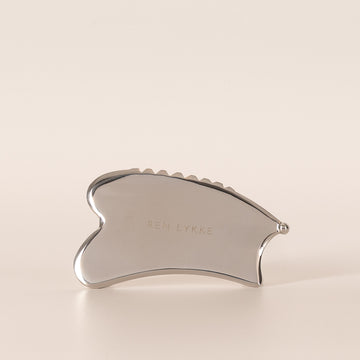 REN LYKKE gua sha i stål