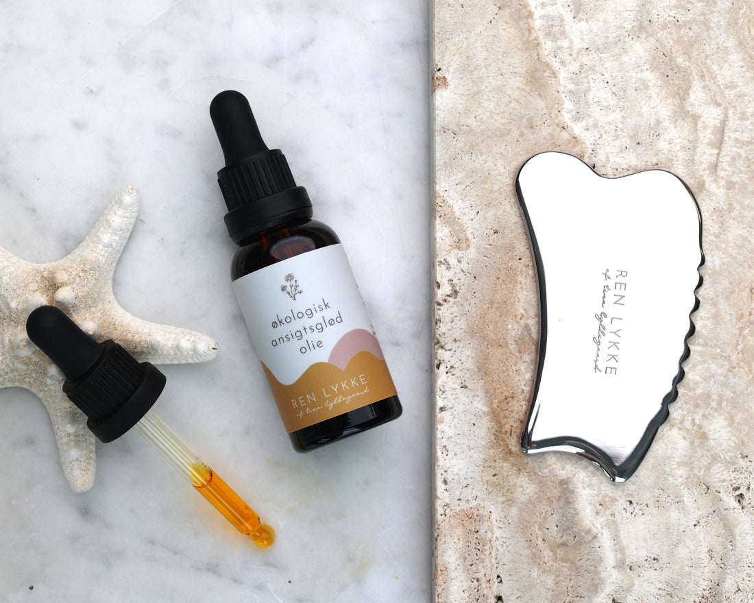 gua sha og ansigtsolie glød