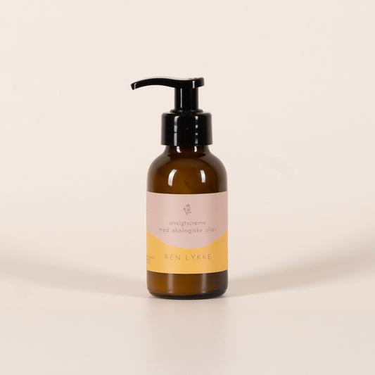 Ansigtscreme med økologiske olier i pumpeflaske
