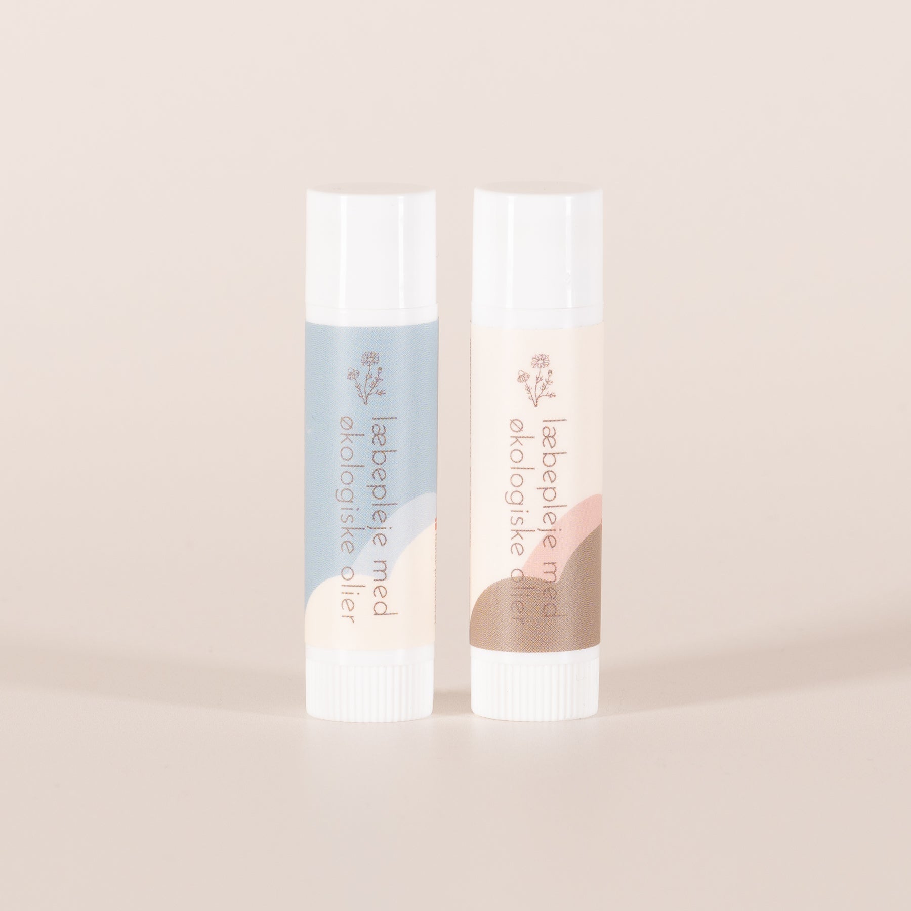 Læbepomade fra REN LYKKE i to varianter