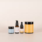 REN LYKKE sæt med 4 bestsellere: Rensebalm, fugtserum, ansigtsglød olie og kropsbalm.